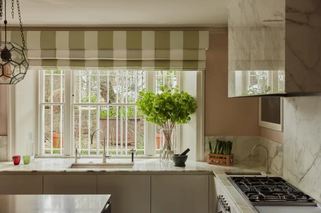 My kitchen in London, roman blinds in my Arthur Stripe Castle Wall. Pink and green should always be seen 💚 💗